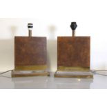A pair of Art Deco-style faux patinated bronze table lamps,