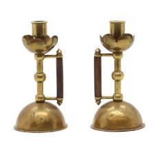 A pair of brass Benham & Froud candlesticks