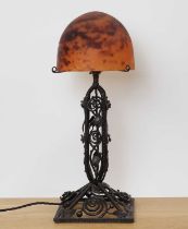 A Daum glass and wrought iron table lamp