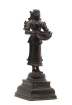 A bronze Dipa Lakshmi oil lamp