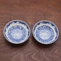 A pair of Chinese blue and white saucers,