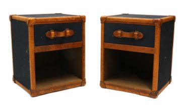 A pair of Feather & Black leather bedside cabinets