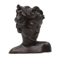 An Art Deco patinated bronze bust,