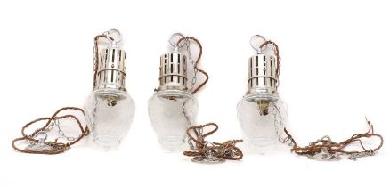 Three hanging light fittings,