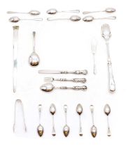 A collection of silver flatware