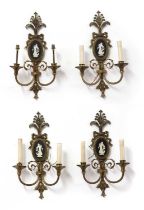 A set of four twin branch wall lights,