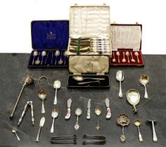 A collection of silver flatware