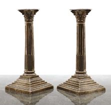 A pair of Edwardian silver Composite column candlesticks