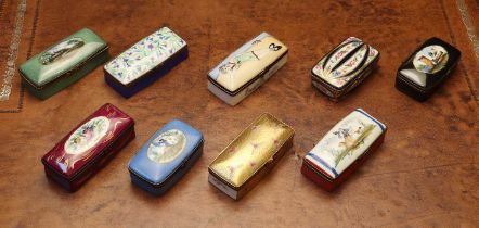 A group of nine Limoges porcelain stamp boxes,