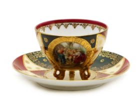 A Vienna style porcelain cup and saucer,