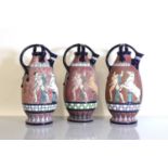 A set of three Czech Art Deco Amphora pottery ewers,