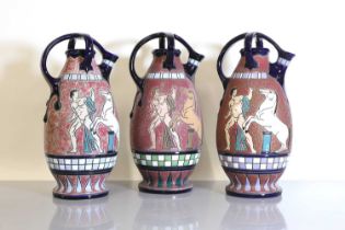 A set of three Czech Art Deco Amphora pottery ewers,