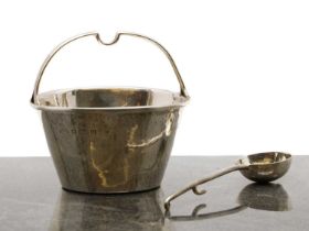 A silver cream pail and spoon