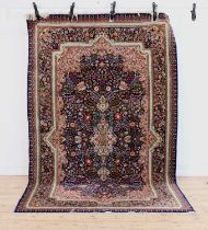 A Kashan rug,