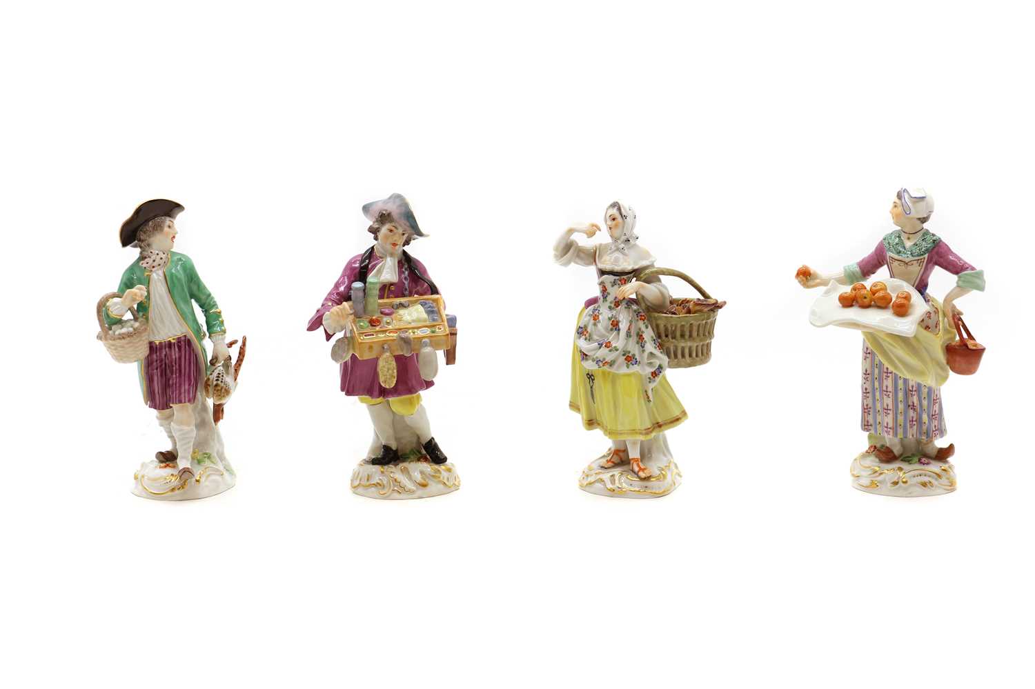 A group of four Meissen porcelain figures