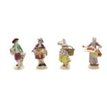 A group of four Meissen porcelain figures