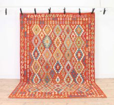 A large flat weave Kilim carpet