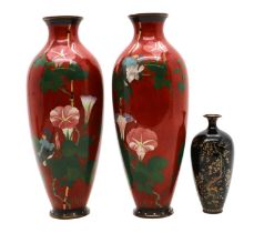 A pair of cloisonné vases together with one other,