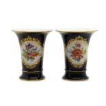 A pair of Meissen porcelain spill vases,