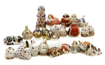 A collection of Royal Crown Derby porcelain paperweights