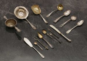 A small collection of silver flatware