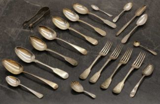 A collection of silver flatware