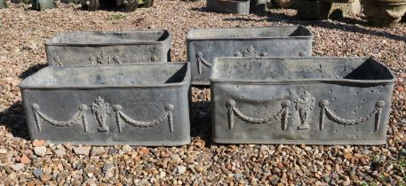 A set of four lead trough planters,