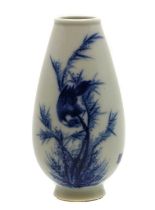 A small Chinese blue and white vase,