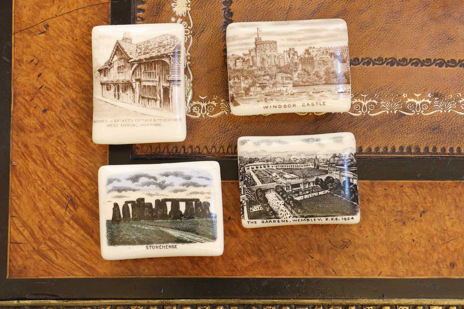 A group of four W H Goss porcelain stamp boxes