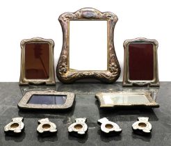 A group of silver frames