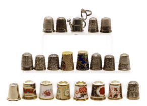 A group of silver thimbles,