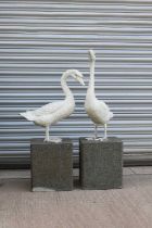 Two painted metal geese,