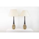 A pair of painted table lamps,