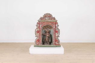 A carved, painted and silvered-pine architectural niche or tabernacle