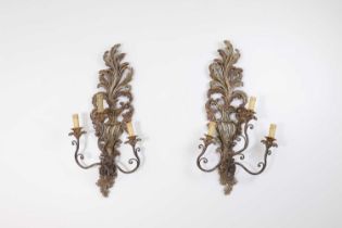 A pair of carved and painted wood wall lights,