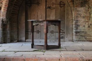 A Charles I-style oak side table,