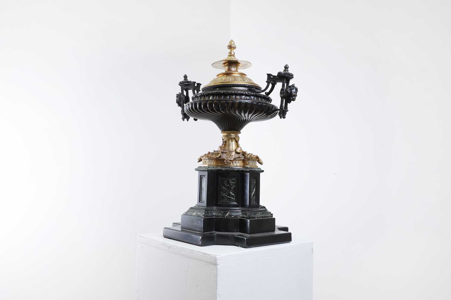 A Louis XVI-style marble, bronze and ormolu-mounted urn,