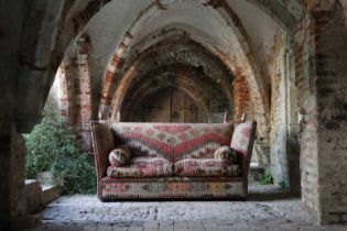 A kilim-upholstered Knole sofa by George Smith