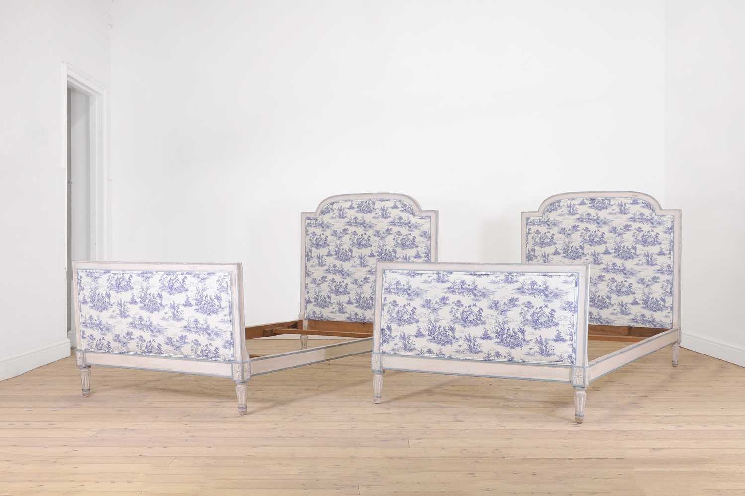 A pair of Louis XVI-style painted beech single beds,