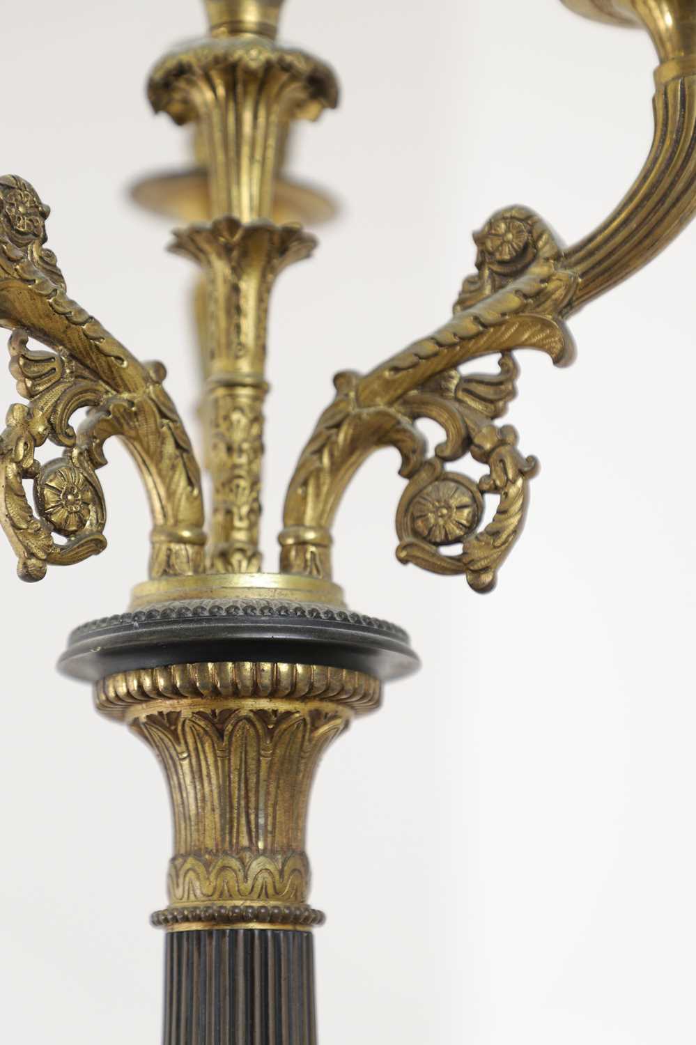 A pair of Empire-style bronze and parcel-gilt candelabra, - Image 2 of 8