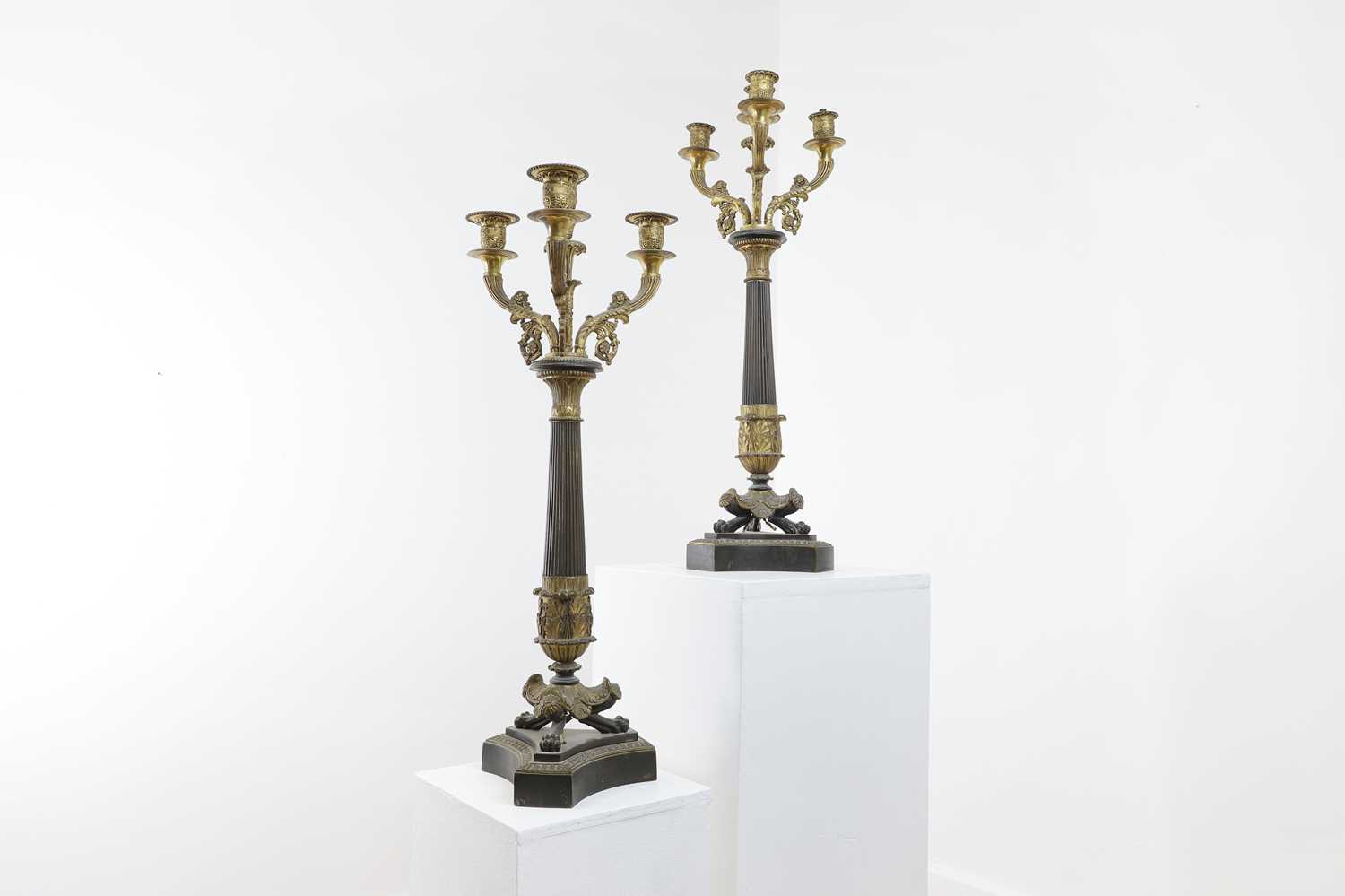 A pair of Empire-style bronze and parcel-gilt candelabra, - Image 5 of 8