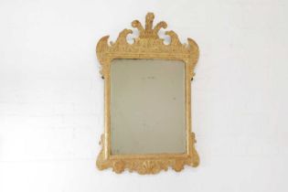 A gilt-gesso pier glass,