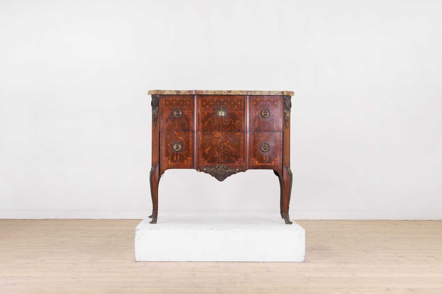 A Transitional-style tulipwood and marquetry commode,