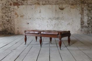 A Regency-style mahogany and leather stool,