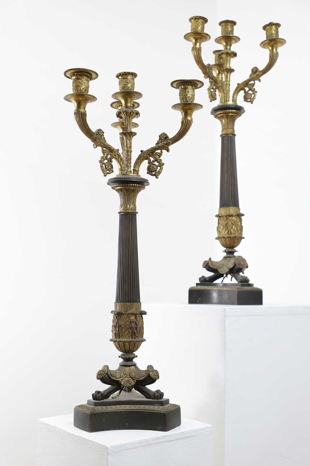 A pair of Empire-style bronze and parcel-gilt candelabra, - Image 8 of 8