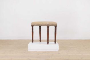 A walnut stool,
