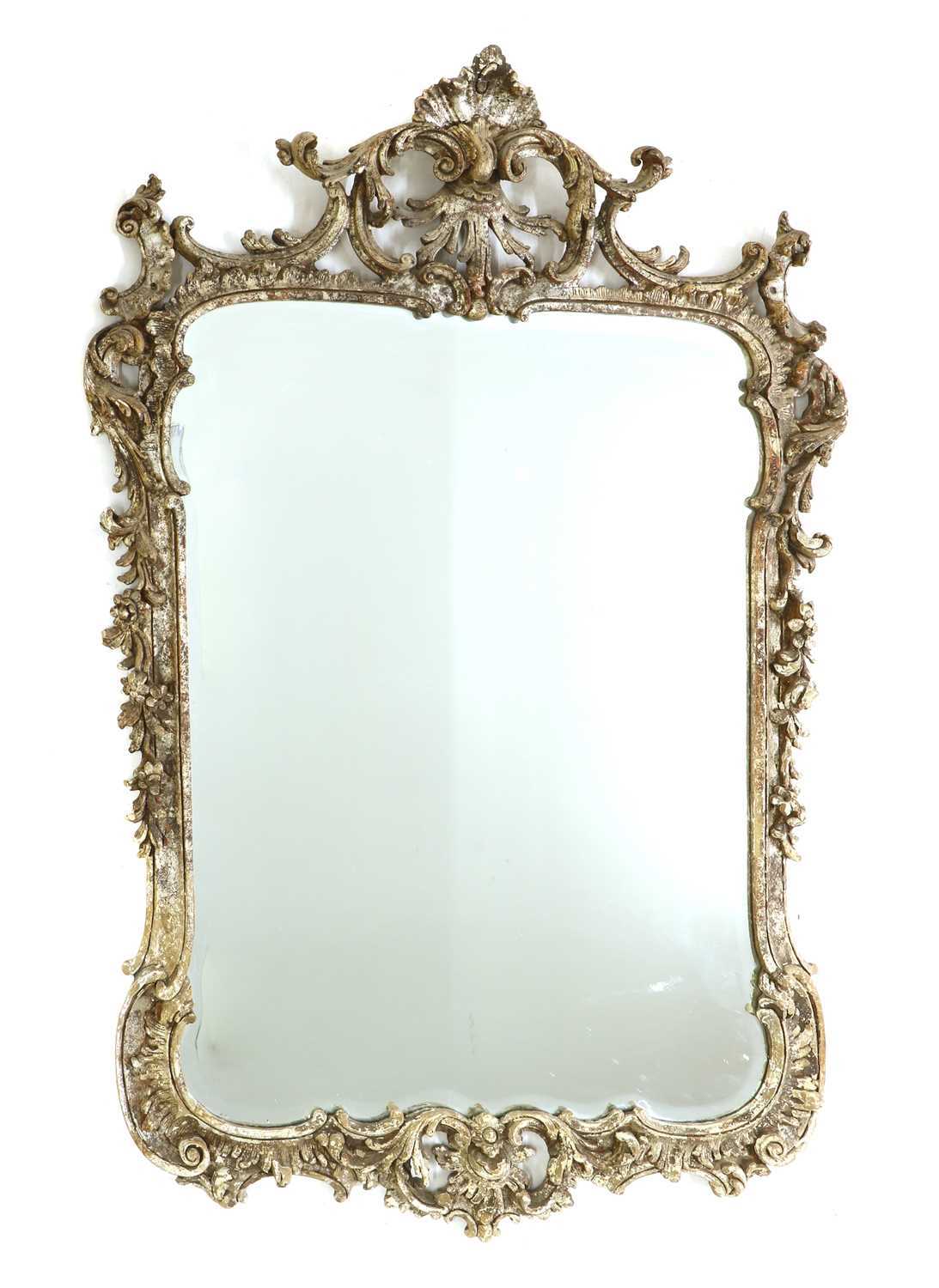 A large giltwood wall mirror,