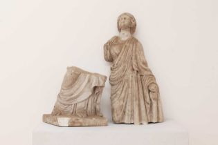 A fragmentary Roman-style carved marble figure of a female,