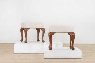 A pair of Queen Anne-style yew wood stools,