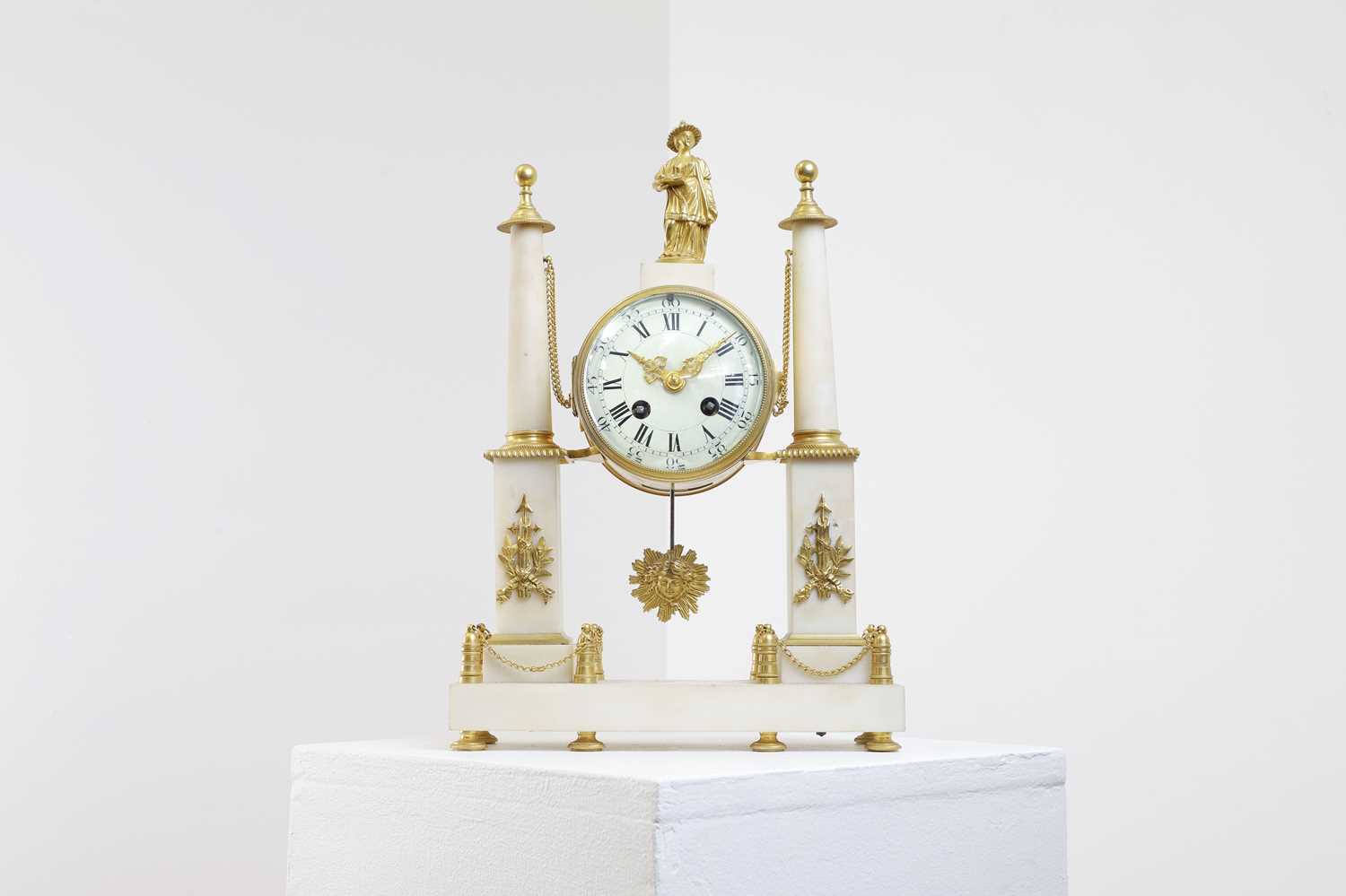An alabaster and ormolu mantel clock,
